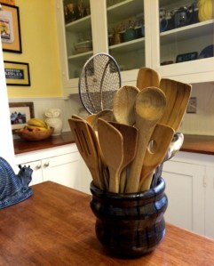 wooden spoons in Samirs pottery crock